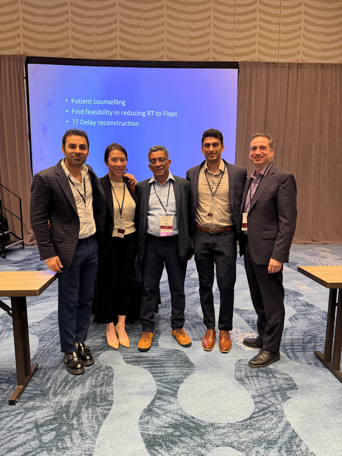 Dr. Garg moderating educational panel at American Society for Reconstructive Microsurgery